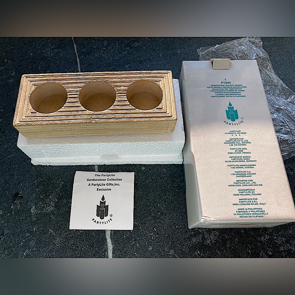 2/$15 - PartyLite - Gardenstone tealight holder
P7245 - holds 3 tealights